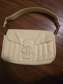 Steve Madden Purse. Slighty Used. There Is a Stain On The Inner Lining.