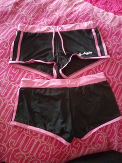 Pink and black booty shorts