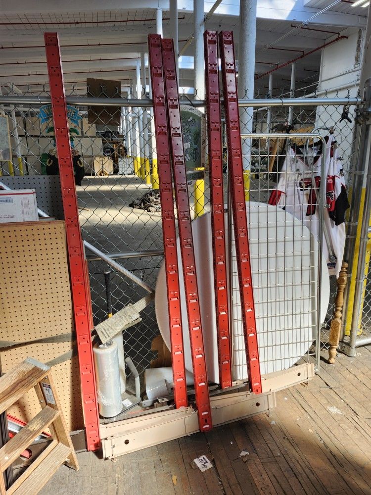 I Have A BUNCH OF Stores Shelfing & Pole Looking To Sell IN Lot