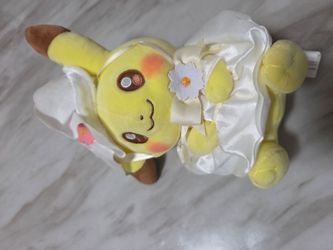 Authentic Pokémon Center Pikachu Photogénique Easter Plush for sale! Limited spring edition.