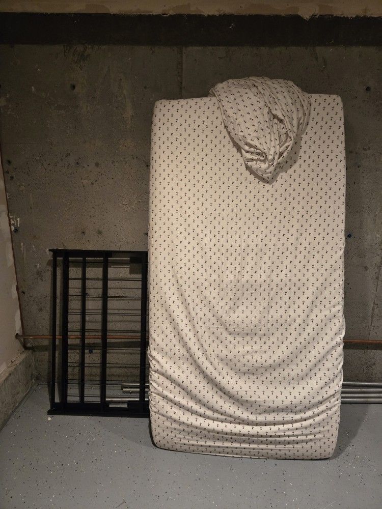 EXCELLENT CONDITION twin mattress and bed frame