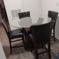 Glass table and 4 chairs