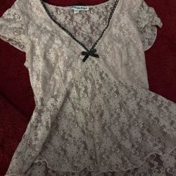 gray lace blouse with black bow