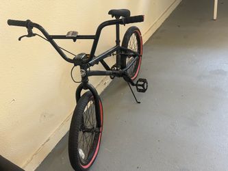 Black BMX Bike with Red Rims