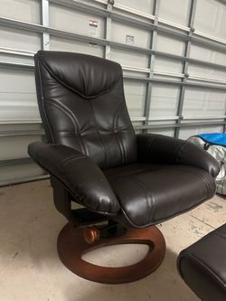 Nice Brown/Black Reclined Chair with foot rest
