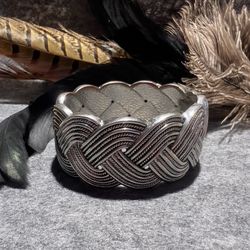 Beautiful silver metal costume cuff, bracelet, twist, braid style.