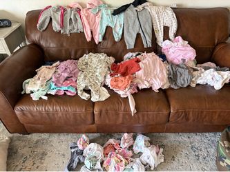 Baby girl clothes and swaddles