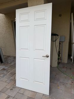 Solid wood door with hardware