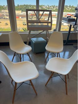 4 white dining chairs