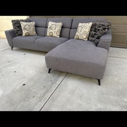 Sectional Couch. Excellent Condition. Living Spaces Measurements  are 113x 65. Excellent Condition. No Changed. Ripped Burns Pet Free Lightly ly Used.