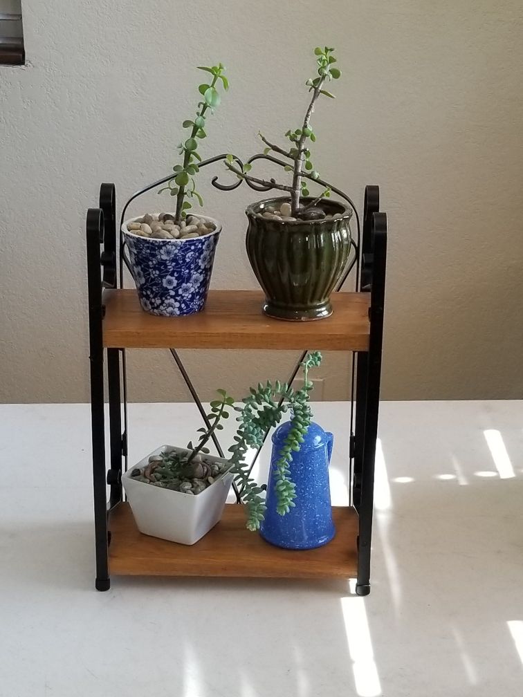 Small shelf, bookshelf, stand, rack. Can be used for anything, very sturdy and solid.