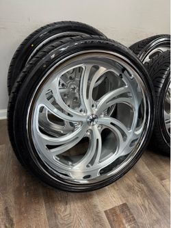NEW staggered 24x9 and 24x11 infamous racing wheels wrapped in Lexani tires