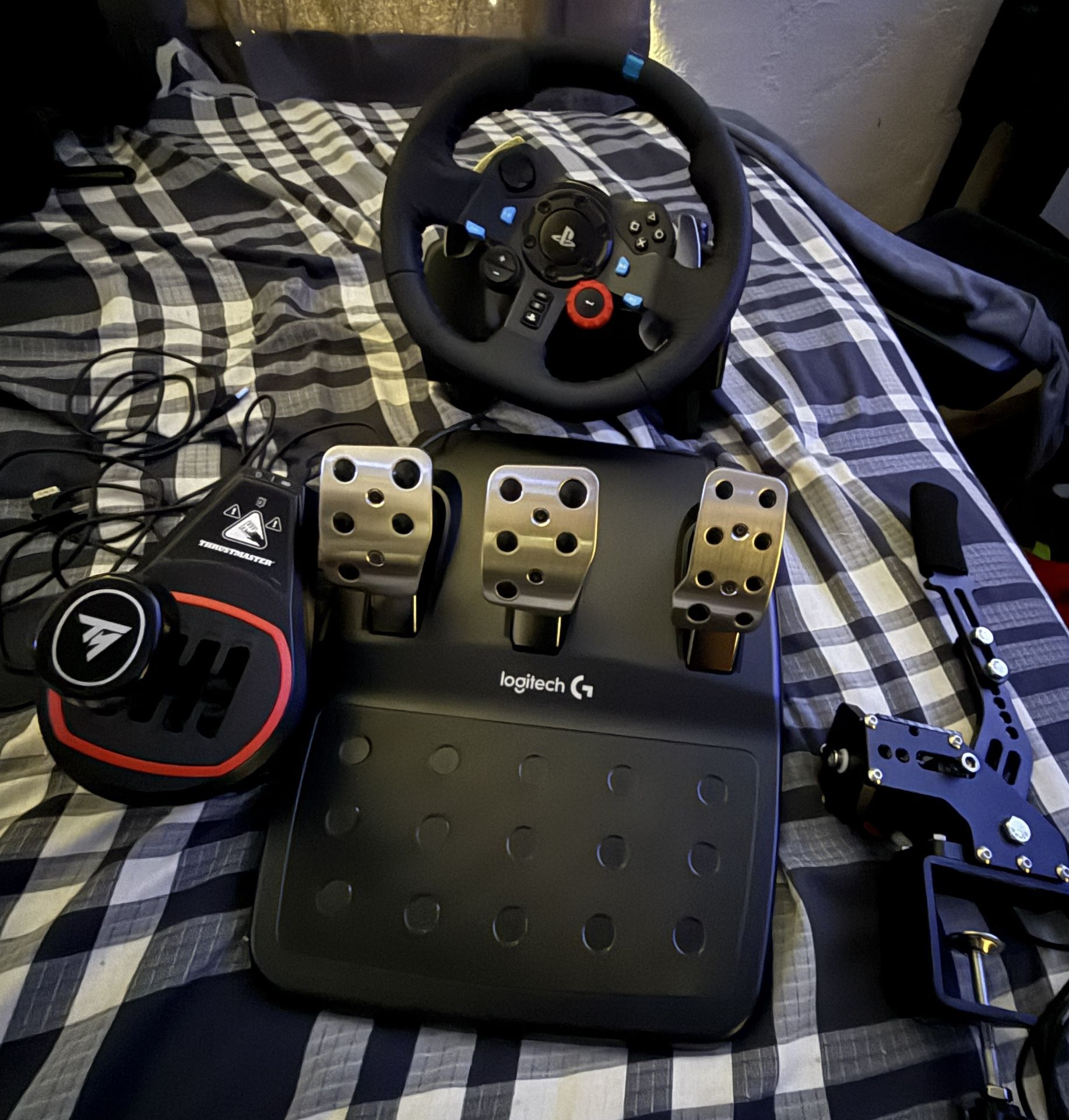 Logitech g29 steering wheel, thrust master 7 speed H shifter, and Hand break for pc sim racing.