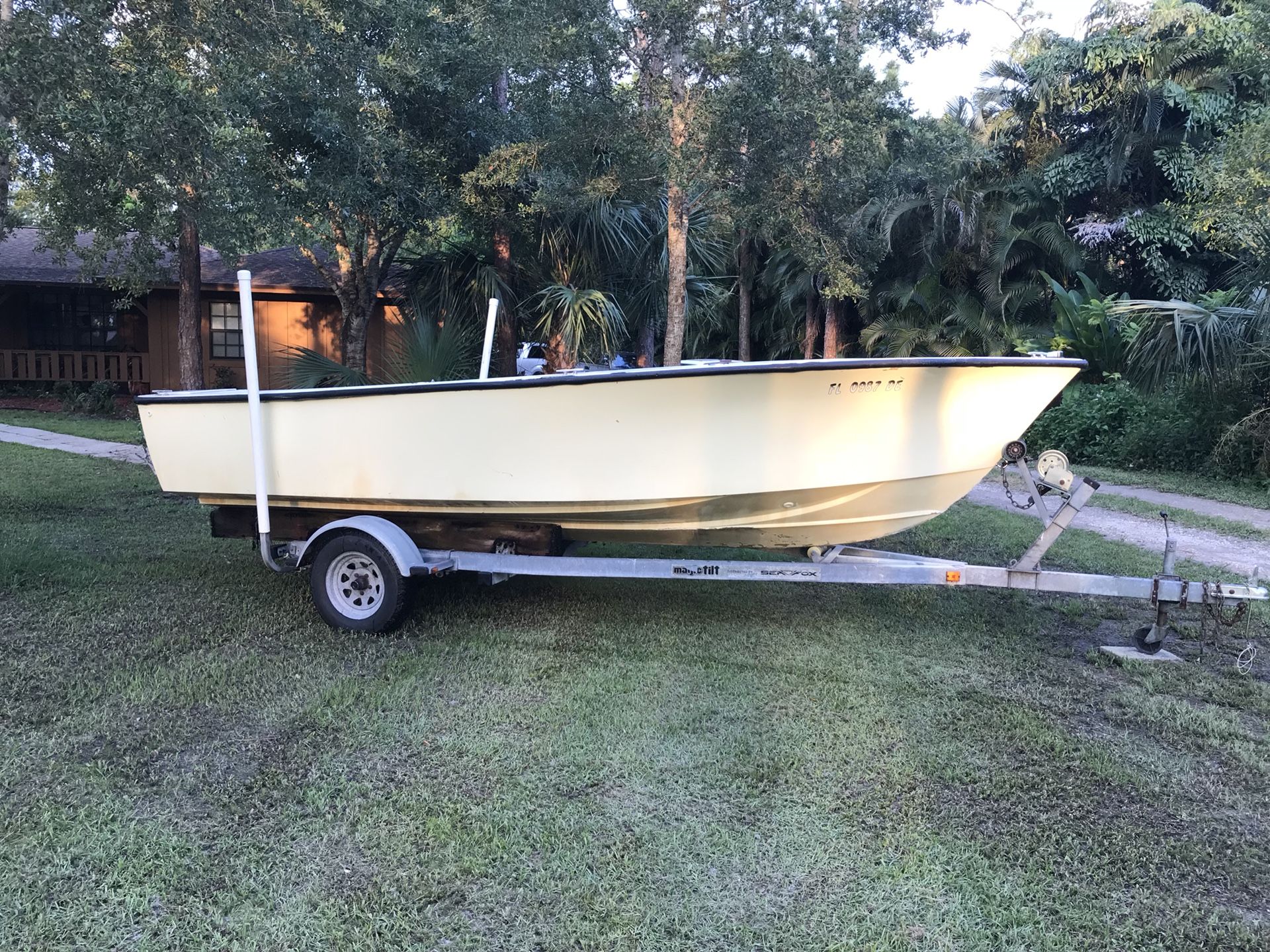 18 ft Seacraft with trailer. No engine. Stripped down.Needs title