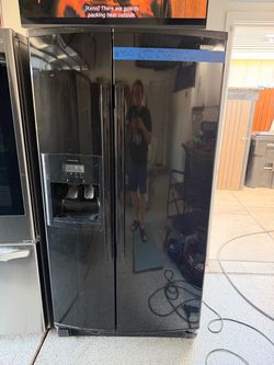 Black Side-by-Side Refrigerator with Ice and Water Dispenser