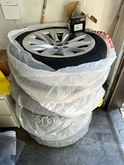 Tesla 19 inch OEM rims