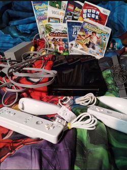 Wii console with games, $120