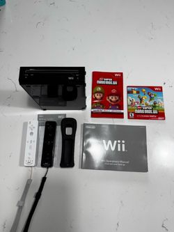 Wii with Super Mario Bros, 2 Controllers and HDMI adapter!