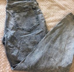 Loose skinny jeans with decorative holes size medium