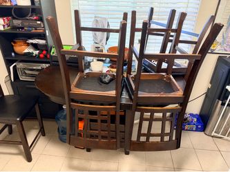 Wood table. 4 chairs