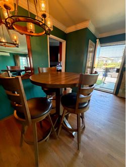 Lightly used Bobs Furniture table  $200.00