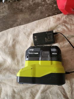 Rioby Charger And 2 Batteries And Skillsaw
