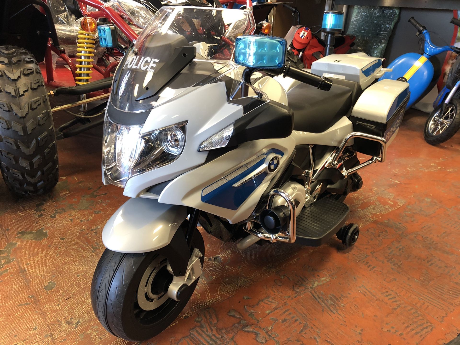 12V kids ride on Police Bike Brand new with lights and Police