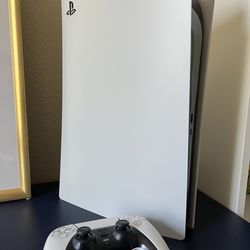 PS5 with controller and cables