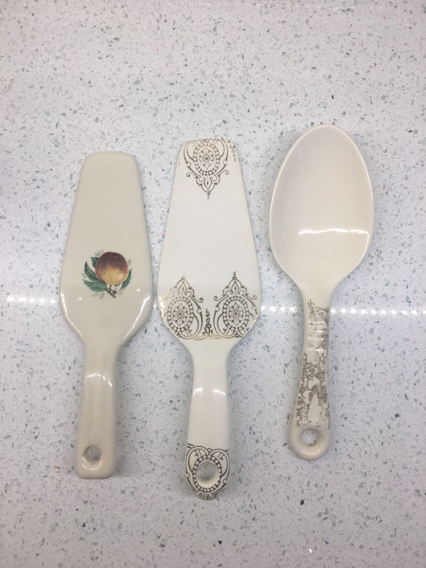 Porcelain/ceramic serving spoon & spatulas antique