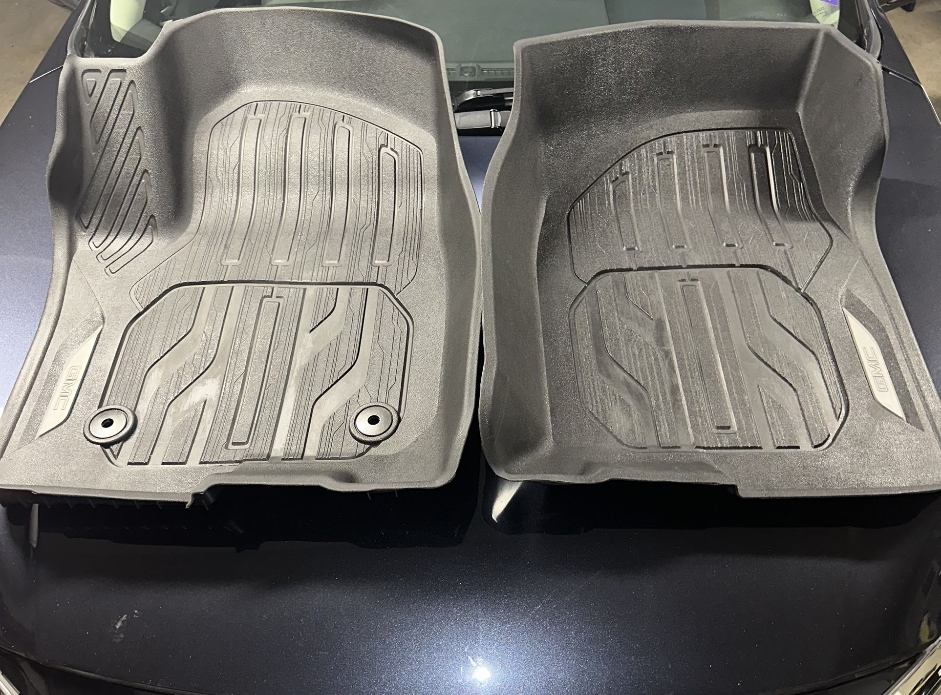 First-Row Premium All-Weather Floor Liners in Jet Black with GMC Logo (for Models with Center Console)