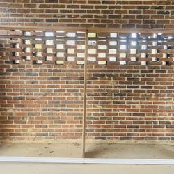 Custom-Built Natural Unfinished Wooden Closet Organizer With Metal Rod