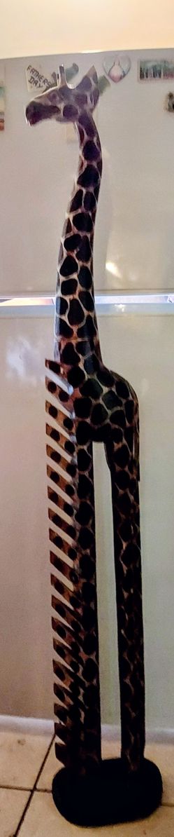 A wooden giraffe.