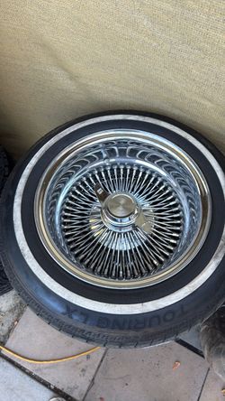 100  spoke wheels Remington tires 14”