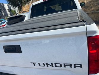 Truck bed cover