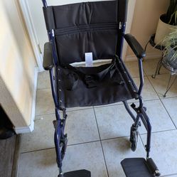 Brand New Black Wheel Chair 