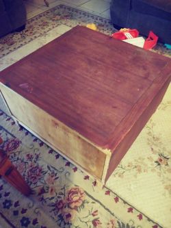 Center table with cubby hole mykids used it to store their toys. Its real heavy . In ok condition. Asking $25