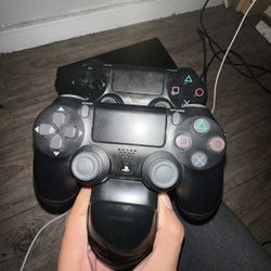 PS4 Gaming Package - Great Condition PS4 Console, 2 Controllers, and Controller Charging Stand