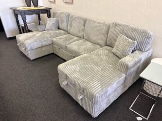 Sleeper sofa in gray corduroy with storage