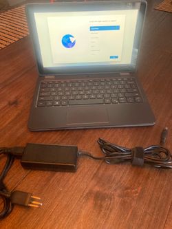 Dell 3120 Latitude with charger and case .