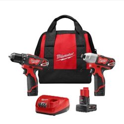 Milwaukee M12 Drill Set Combo Impact, Driver, 2 Batteries, Charger And Carrying Tool Bag Brand New Still In Original Packaging $150 Firm FIRM. If Stil