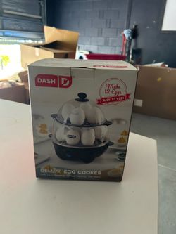 Deluxe egg cooker  brand new still in the box never opened