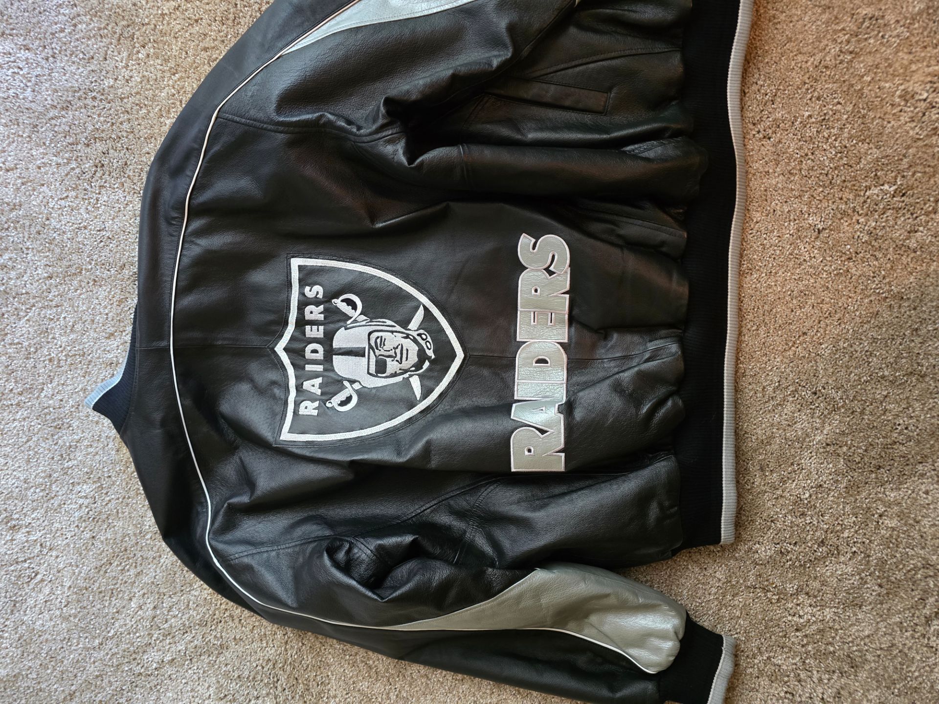 Raiders leather jacket large