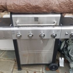 Kenmore gas grill. Side burner. Temperature gauge and igniter not working.  No bottle. Needs a good cleaning.