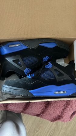 Air Jordan 4 Black and Blue Sneakers