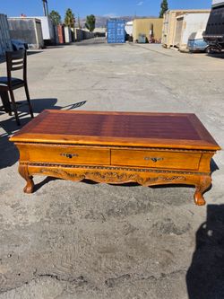 Carved Wood Coffee Table with Drawers
