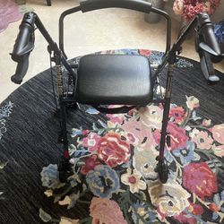 Brand new never used walker with Storage and a chair to sit down