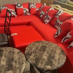 Red sectional and cocktail ottoman for $1000. Brand new