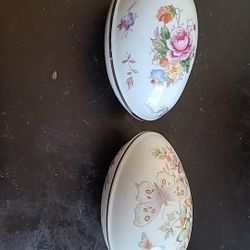 GORGEOUS Pair of Avon 7" Ceramic Egg Shaped Trinket Holders.
One is floral & other butterflies.
