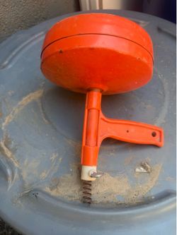 Small for small projects General Wire Spring Co. By hand  Spin Through Drain Cleaner.  Works good only