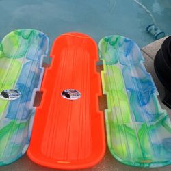 Used Once.  Dayglow Toboggan Snow Sled 